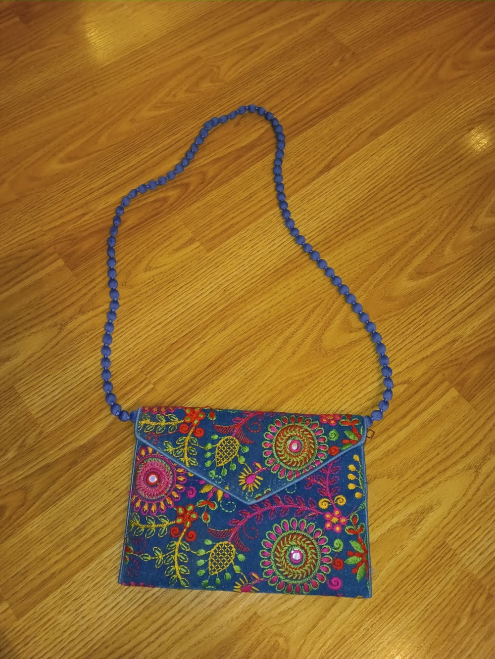 Trendy boutique Blue Embroidered Floral Beaded Strap Clutch
